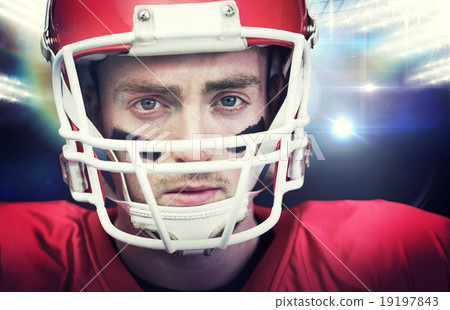 Composite image of portrait of focused american football player 19197843