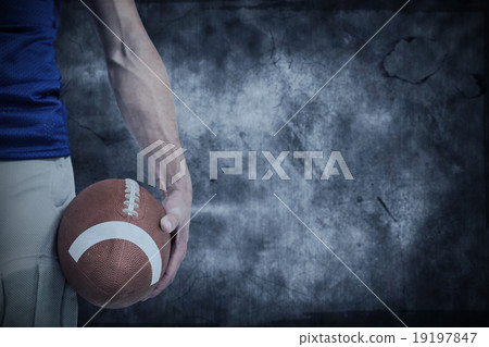 Composite image of midsection of sports player holding ball 19197847