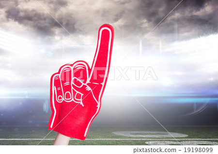 Composite image of american football player holding supporter fo 19198099