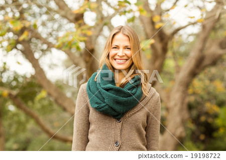Smiling woman posing for camera Smiling woman posing for camera 19198722