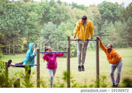 Happy friends having fun on a hike Happy friends having fun on a hike 19198972