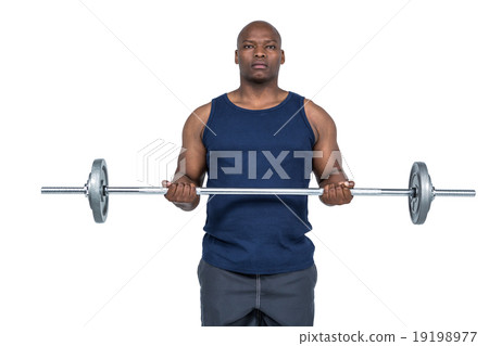 Fit man lifting heavy barbell Fit man lifting heavy barbell 19198977
