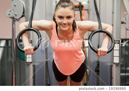 Woman focused and working out 19198980