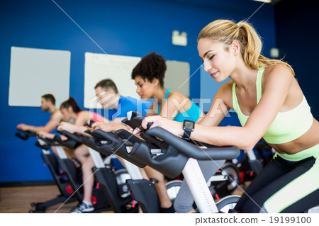 Fit people in a spin class 19199100