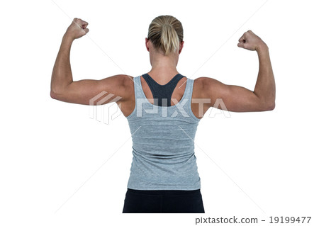 Rear view of muscular woman flexing muscles 19199477