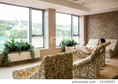 Handsome man relaxing in thermal suite Handsome man relaxing in thermal suite 19199983