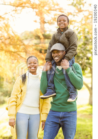 Portrait of a young smiling family Portrait of a young smiling family 19200340