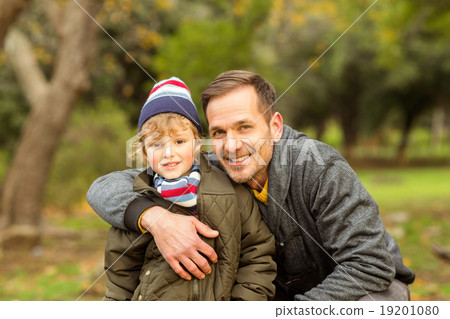 Happy father posing with his son Happy father posing with his son 19201080