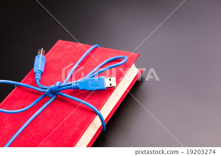 Ribbon from the usb cable on book 19203274
