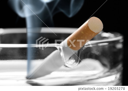 Cigarette on ashtray Cigarette on ashtray 19203278