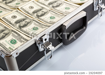 Case full of dollar on white background Case full of dollar on white background 19204097