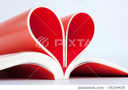 Book pages folded into a heart shape 19204420
