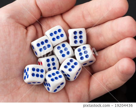 Gabbling dices in palm of hand 19204436