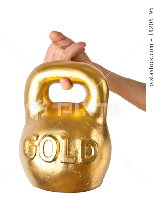 A hand holding heavy weight of gold A hand holding heavy weight of gold 19205195