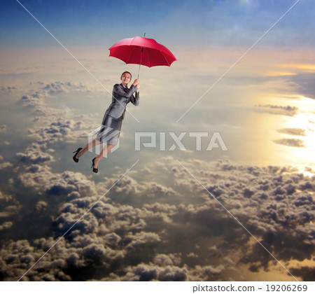 Woman flying in the sky with umbrella Woman flying in the sky with umbrella 19206269