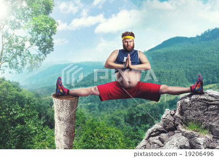 Stock Photo: Fat man does the splits