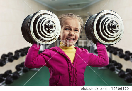 Little girl with dumb-bells Little girl with dumb-bells 19206570
