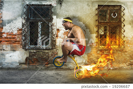Adult crazy man cycling on child's bicycle Adult crazy man cycling on child's bicycle 19206687
