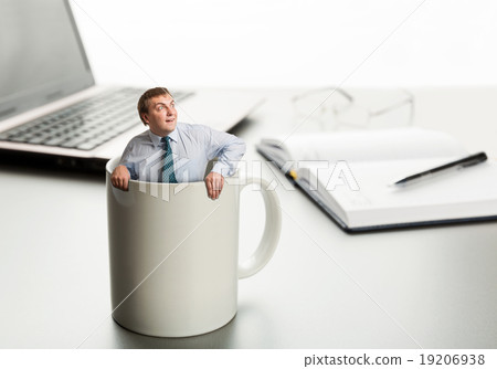Astonished man in white cup Astonished man in white cup 19206938