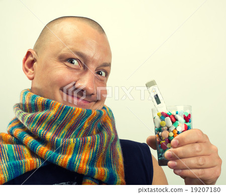 Man drinking pills Man drinking pills 19207180