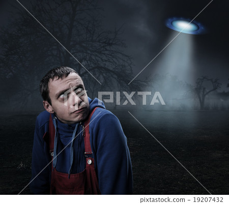 Guy scared by UFO Guy scared by UFO 19207432
