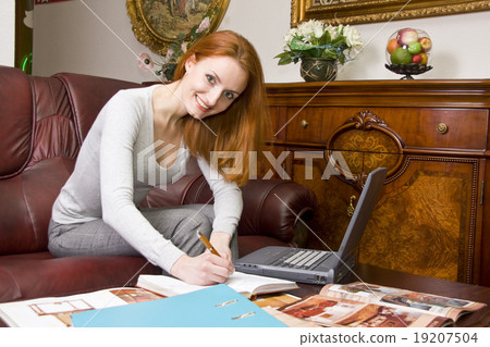 Smiling businesswoman at work 19207504