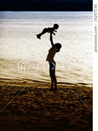 Mother and baby at beach Mother and baby at beach 19207536