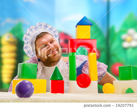 Man weared as baby play indoor 19207791