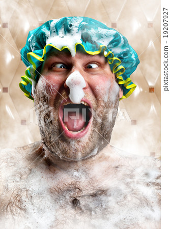 Bizarre man with soap foam on nose 19207927
