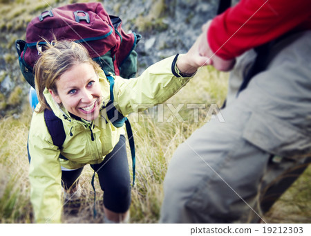 Couple Hiking Helping Climbing Mountain Concept Couple Hiking Helping Climbing Mountain Concept 19212303