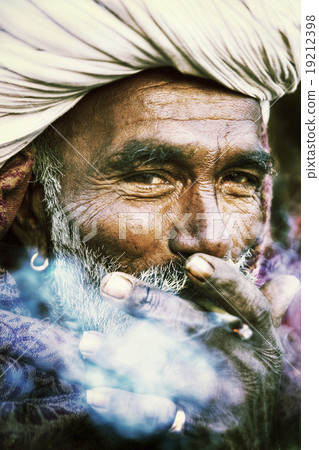 Indigenous Indian Man Smoking Happily Concept 19212398