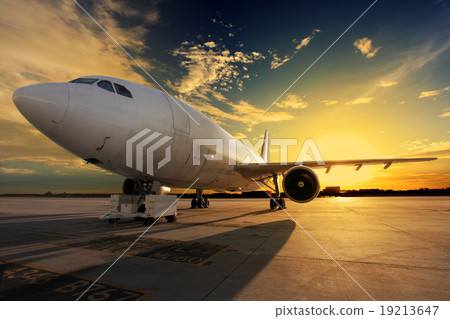 Airplane at sunset - back lit 19213647
