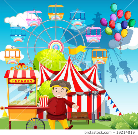 Man selling popcorn at the funpark Man selling popcorn at the funpark 19214819