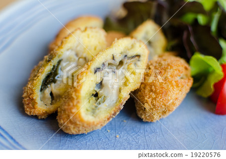 Deep fried breadcrumbed fresh sea oyster 19220576