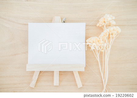 White canvas art board on wood texture background White canvas art board on wood texture background 19220602