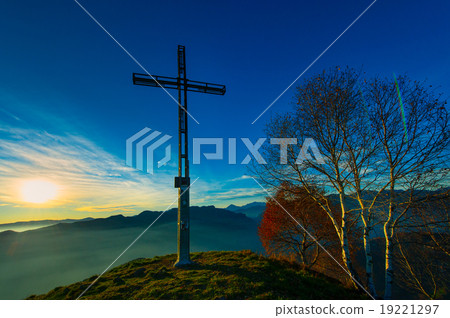 Summit of a mountain with cross 19221297