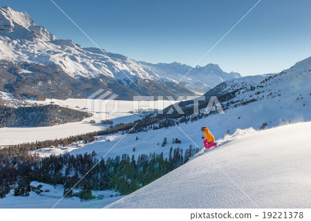 Girl telemark skier on the slope above the valley of lakes 19221378