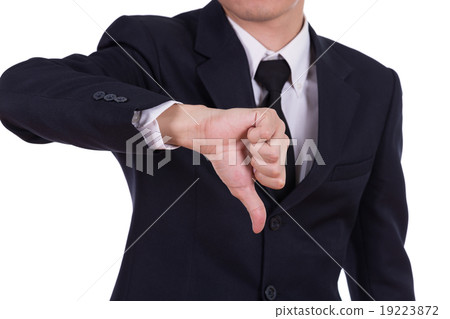Businessman pointing thumbs down 19223872