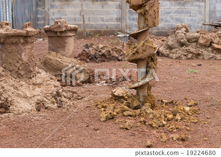 construction machine for drilling holes in ground 19224680