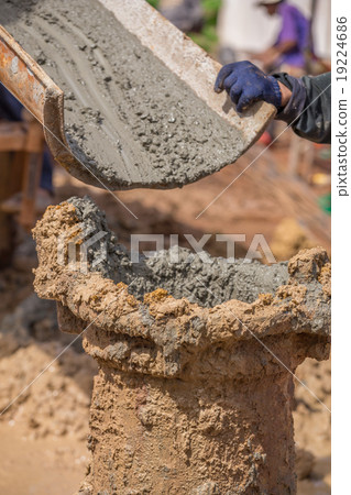 Pouring cement with steel poles Pouring cement with steel poles 19224686