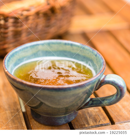 Norman apple cider in a typical ceramic cup 19225035