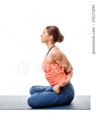 Sporty woman doing Ashtanga Vinyasa yoga asana Sporty woman doing Ashtanga Vinyasa yoga asana 19225895