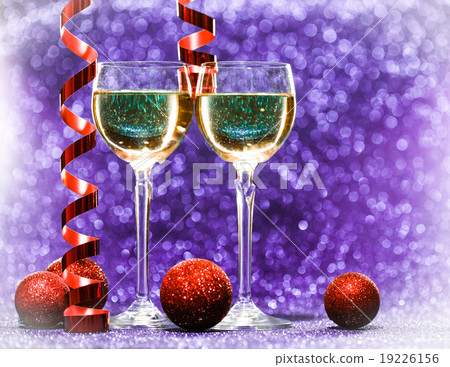 Two glasses of champagne with lights in the 19226156