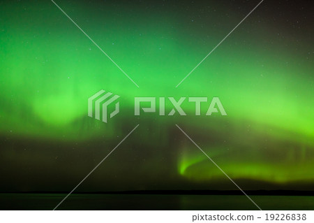 Northern lights over lake in finland Northern lights over lake in finland 19226838
