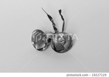 Gold bells on a white background. 19227129