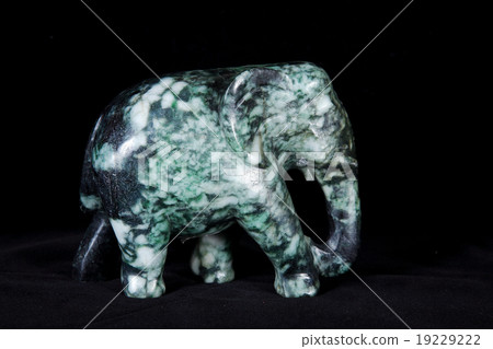 Jade sculpture of elephant isolated on black 19229222