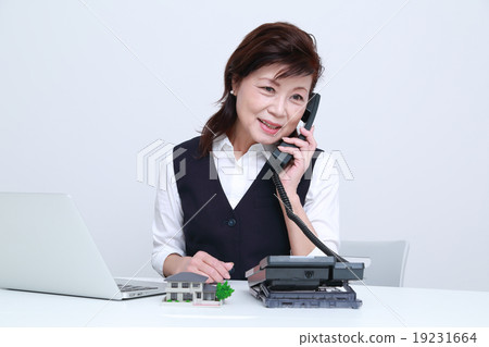 Working woman in her 60's Working woman in her 60's 19231664