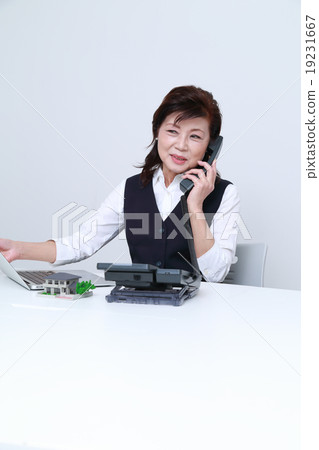 Working woman in her 60's Working woman in her 60's 19231667