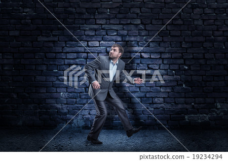 Scared businesswoman  19234294