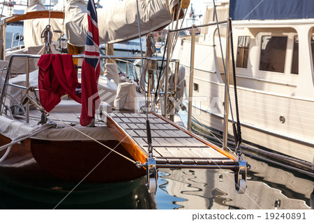 wooden ladder on marine yacht staying in port 19240891